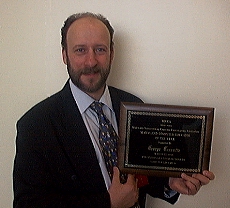 Accepting the MICCA Md. Computer Educator of the Year Award